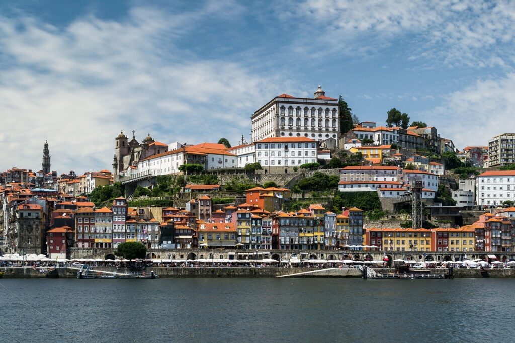 Colorful buildings and riverside cafes in Porto's Ribeira District